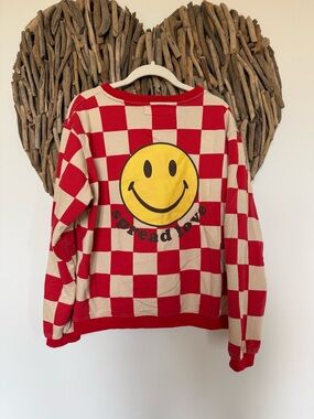 Minimalist Folk Co red and Cream Check Sweatshirt with Yellow Smile Graphic